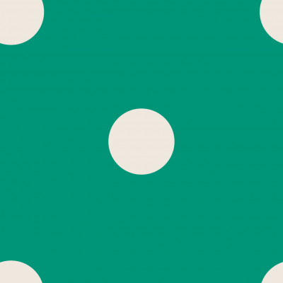 Cream polka dots on green background